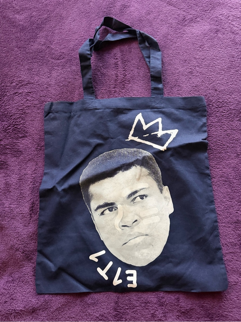 Black Graphic Tote Bag with Portrait and Crown Design